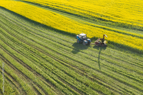 Agricultural machinery during the harvest of rapeseed