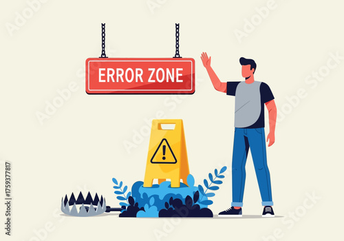 Man warns of error zone with trap and caution sign.