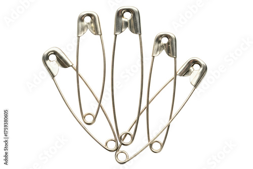 Several metal safety pins fanned out for sewing isolated on a transparent background