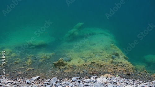 Beautiful Emerald green water in an abandoned tin mine