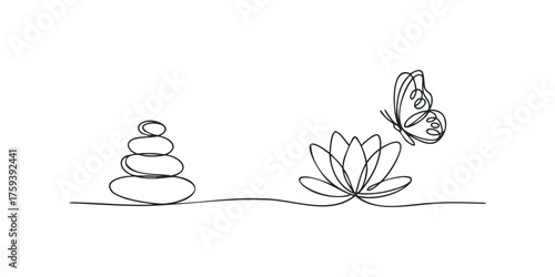 Zen stack of pebbles with a lotus flower and butterfly