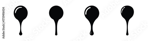 Series of black liquid drops captured mid-fall showing viscosity and surface tension dynamics