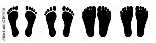 Collection of diverse bare footprints black silhouettes showing toes arches heels and soles detail