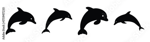 Fourenergeticblackdolphinsleapingjoyfullyinsequencecreatingadynamicunderwaterscene