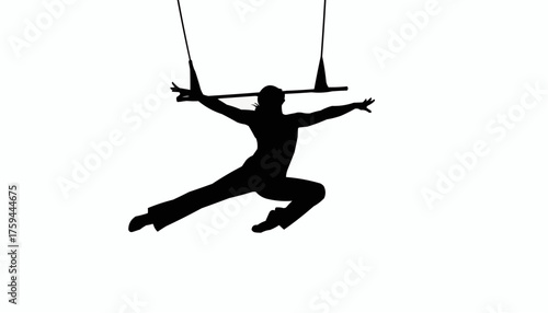 Dynamic silhouette of aerial acrobat performing on trapeze, showcasing strength and control