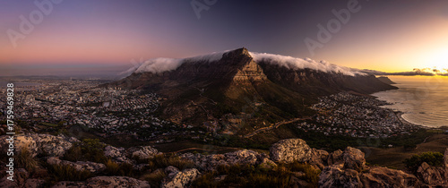 The incredible view from Lion's Head over Table Mountain, Cape Town and Camps Bay at sunset, Cape Town, South Africa.