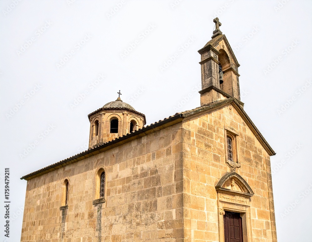 Obraz premium Rustic Stone Chapel with Bell Tower on white background 26233.jpg