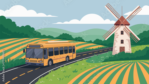 A yellow bus driving on a road through a field with a windmill in the background on a sunny day