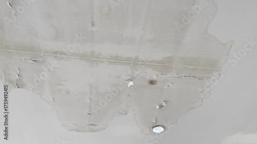 Roof leak cause ceiling stain, ceiling water damage.