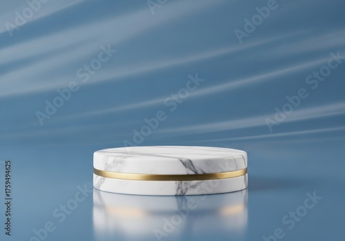 White marble podium with golden accent on smooth blue background for product display