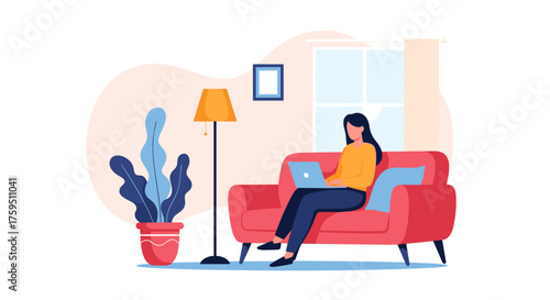 A woman sits on a couch working on her laptop in a cozy living room.