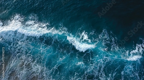 Aerial View of Turquoise Ocean Waves Crashing onto the Shore