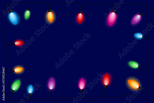 New Year's garland of multi-colored light bulbs on a dark blue background with a place for text