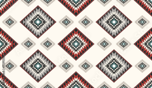 Seamless geometric ethnic pattern inspired by Native American tribal fabric. Traditional Aztec and Navajo style carpet and tile vector design on navy  background. Perfect for textile, wrapping,