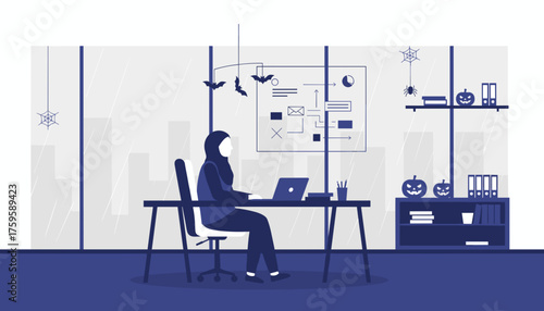 Woman in hijab works on laptop in an office decorated for Halloween Business and holiday concept