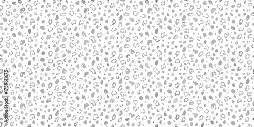 Abstract grayscale leopard print pattern with irregular spots and dots on a white background