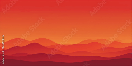 Mountain silhouette at sunset: A misty blue valley view under a red sky