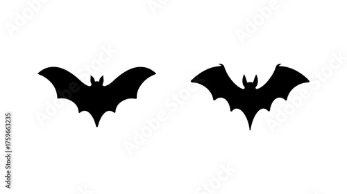 Two silhouette bats flying wings spread against white space ideal for halloween decorations and graphics