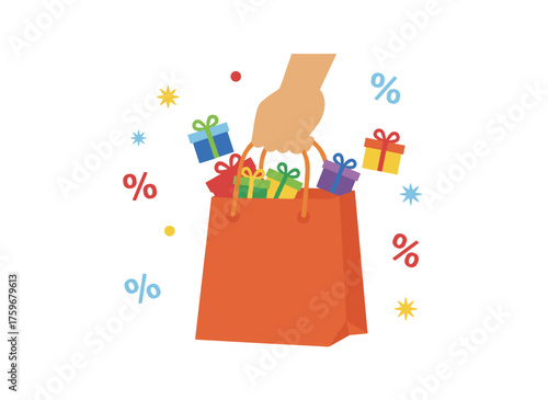 A female hand holds a paper shopping bag brimming with gift boxes, perfect for buying presents for Christmas and New Year's celebrations and fitting gifting themes