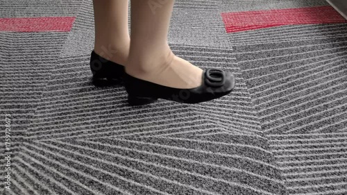 Pacing Feet in Black Shoes: Thoughtful, Anxious Waiting
