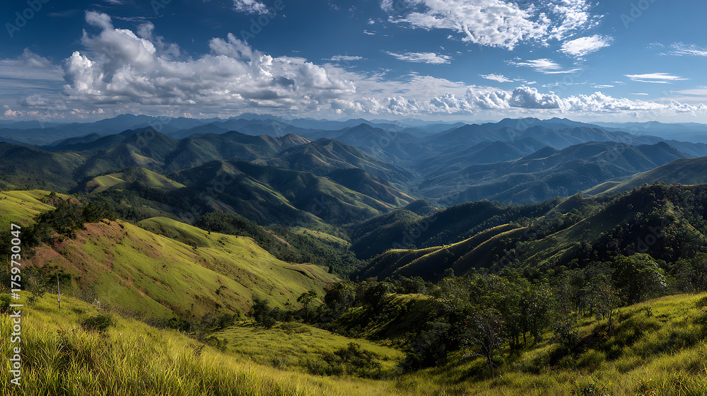 Naklejka premium Verdant layered hills with wispy clouds in Thailand Mae Hong Son, showing a beautiful natural landscape.