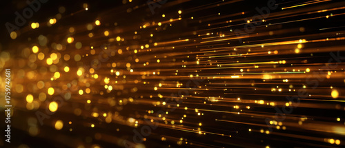 Golden light streaks create dynamic abstract background with sense of motion and energy