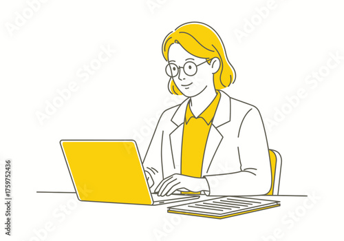 Smiling business woman with glasses working on a laptop at her office desk