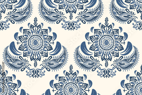 Seamless damask pattern is navy blue with a cream background. Motif Ikat floral embroidery folklore ornament.ethnic oriental stamped appearance. Inspired by traditional Asian or Indian design.