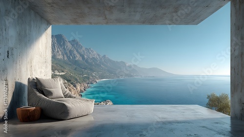 Modern, minimalist living room with raw concrete walls. A designer armchair faces a huge window with a stunning sea and mountain vista in morning light.
