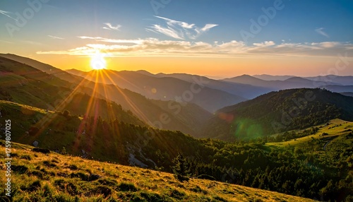 Golden Sunrise Over Rolling Mountain Peaks.