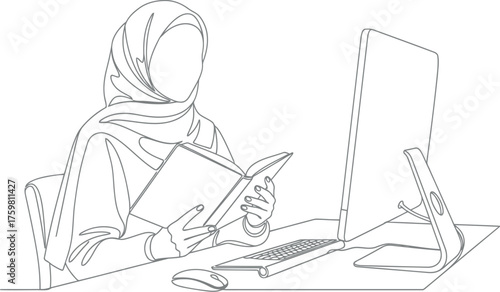 Woman in hijab working at computer with tablet and mouse