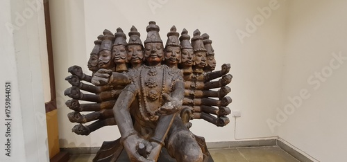Wooden Ravana Statue with Multiple Heads and Arms at the National Crafts Museum and Hastkala Academy in New Delhi, India