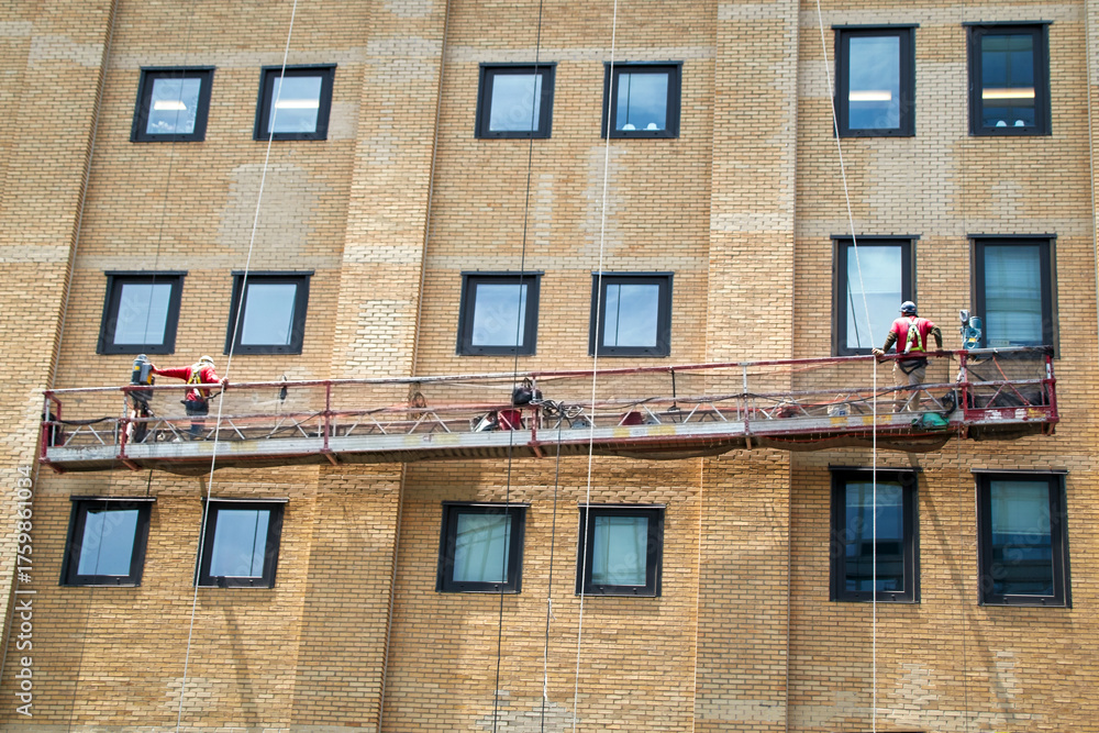 Fototapeta premium Work platform on a building wall in New York City, Manhattan, USA