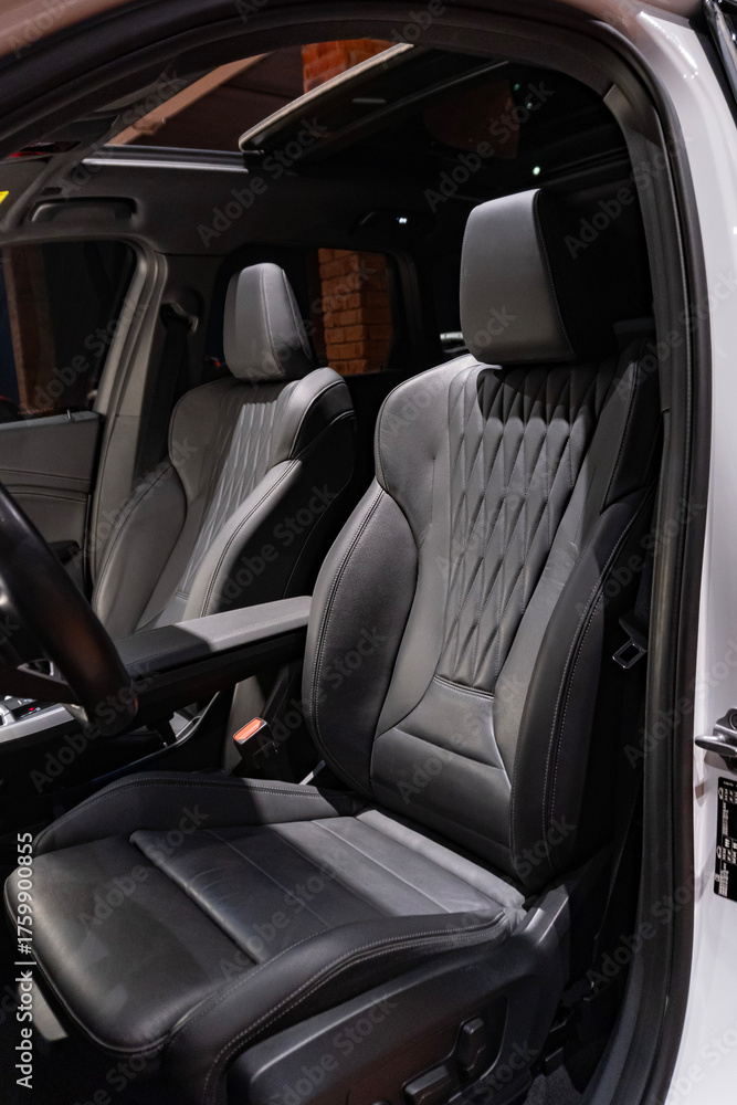 Obraz premium BMW X1 M Sport black leather and Alcantara seats, luxury SUV interior