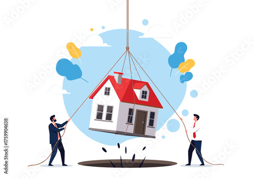 Two businessmen carefully guide a house being lowered into a hole in the ground.