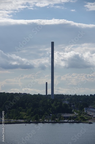 Photography tall industrial chimney high flue stack at stockholm archipelago in sweden