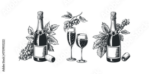 Bottles and glasses of sparkling wine with grapes
