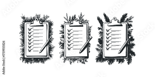 Three Clipboards with Checklists and Pencils Surrounded by Foliage