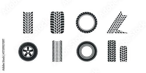 Collection of black tire tread outlines and wheel silhouettes