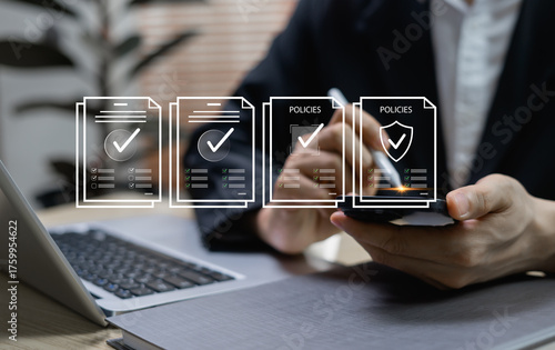 Businessman reviewing documents with checklist, regulations, practices, policies, terms and conditions, and corporate governance for compliance and business management