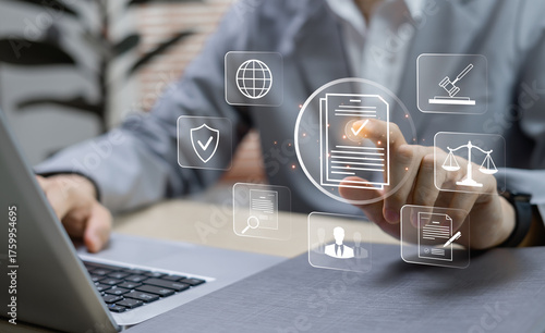 Businessman touching virtual compliance icons, illustrating enforcement of legal rules, regulations, and policy standards in corporate governance and business management
