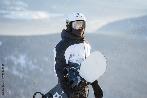 portrait of a man wearing a ski mask and helmet