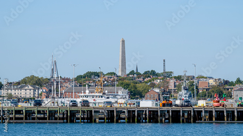 The skyline of downtown Boston with Bunker Hill Monument on the background