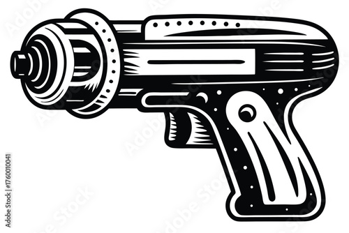 A black and white retro ray gun with distinct design elements is displayed