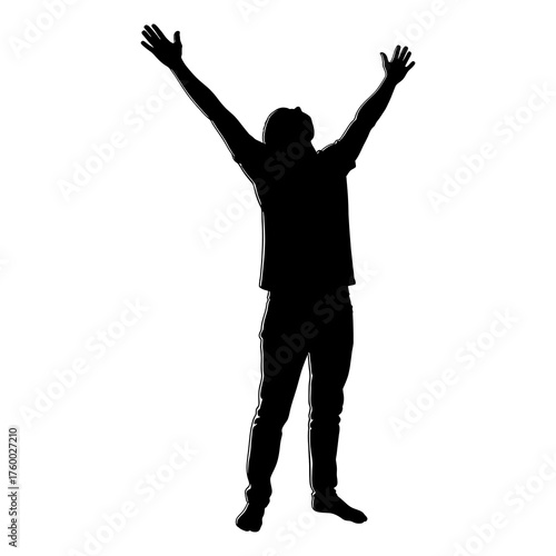 Silhouette of a male raising arms in expression of joy and freedom