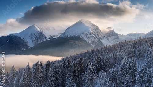 Cloudy Tatra Mountains In The Morning Covered With Snow