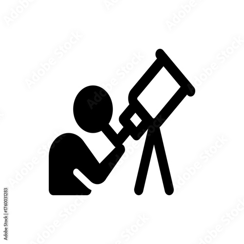A silhouette of a person looking through a telescope on a tripod, observing the night sky and stars above