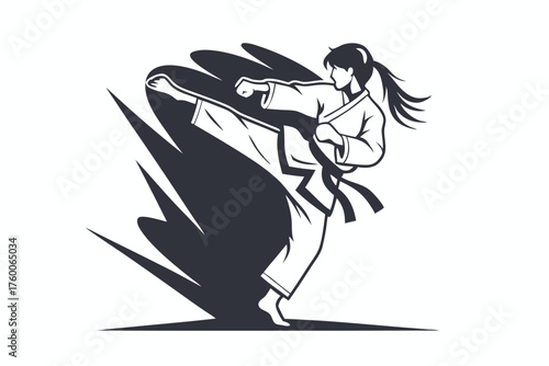 Karateka exhibits a dynamic side kick in silhouette, showcasing martial arts mastery and discipline