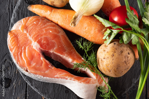 Raw Salmon Steak and Fresh Vegetables. Close-up of Healthy Ingredients.