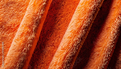 Close Up Of Soft Orange Terry Cloth Towel With Textured Loops